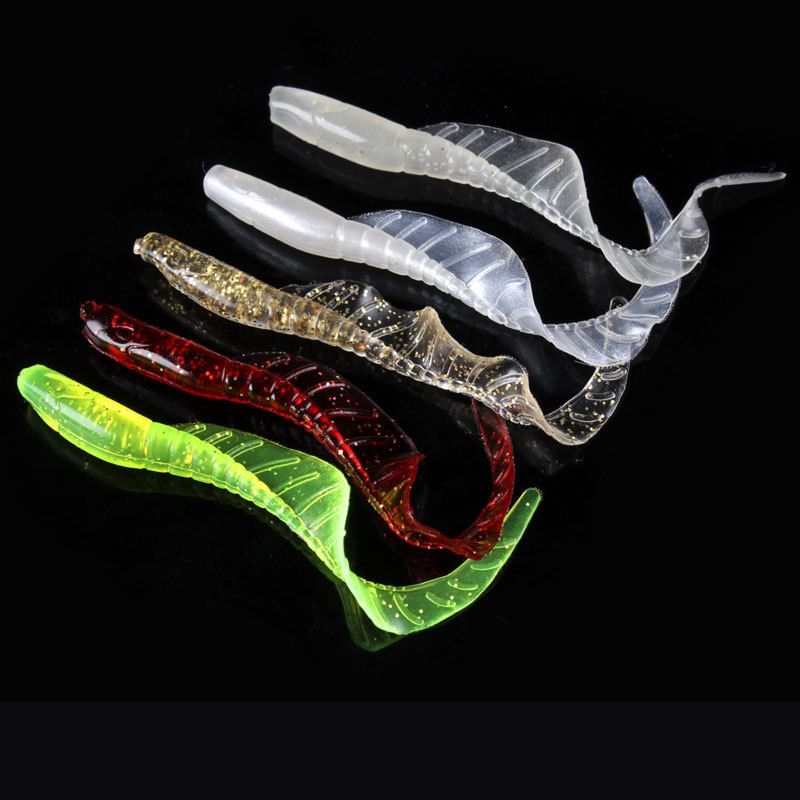 Five colours of curly tail grub laid out together