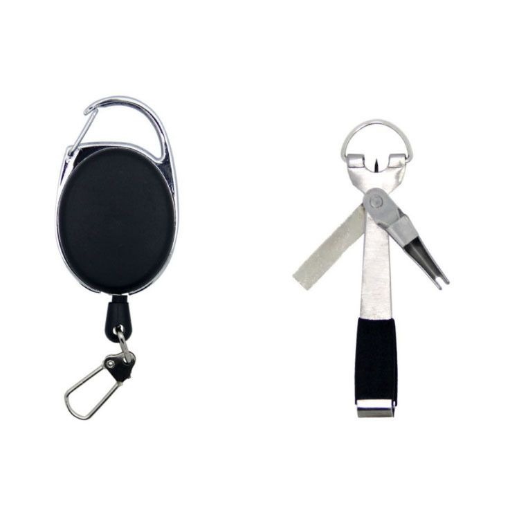 A knot tool beside its pin-on retractor
