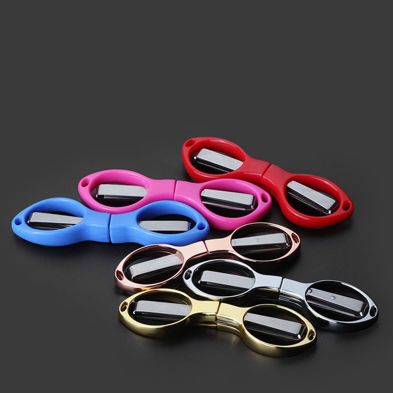 Folding scissors in pink, red, blue, purple, gold and black
