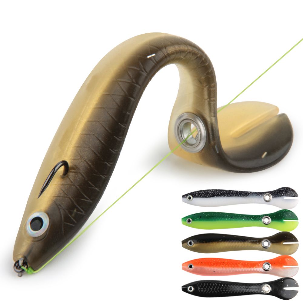 A soft swimbait bent into a curve beside five lures